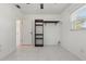 Light and airy bedroom featuring a closet and tile flooring at 62 Magnolia Dr, Debary, FL 32713
