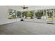 Spacious screened patio with tile flooring offering outdoor living at 62 Magnolia Dr, Debary, FL 32713