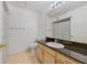 Bright bathroom with updated vanity and shower at 725 Crest Pines Dr # 422, Orlando, FL 32828