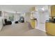 Light and airy living room, adjacent to kitchen and featuring a sliding glass door to the outside at 725 Crest Pines Dr # 422, Orlando, FL 32828