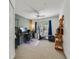 Office space with natural light and exercise equipment at 725 Crest Pines Dr # 422, Orlando, FL 32828