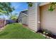Well-maintained backyard with lush green grass and neat landscaping at 7845 Clubhouse Estates Dr, Orlando, FL 32819