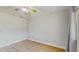 Bedroom with hardwood floors and a neutral color palette, offering a blank canvas at 7845 Clubhouse Estates Dr, Orlando, FL 32819