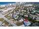 Bright aerial view of a charming beach community and cozy single-Gathering home at 8 Palm Dr, Ormond Beach, FL 32176