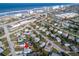 Charming coastal community aerial view, homes near beach, shopping, and Intracoastal waterway at 8 Palm Dr, Ormond Beach, FL 32176