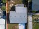 Overhead shot of this lovely home showing the new roof and proximity to neighboring homes at 8 Palm Dr, Ormond Beach, FL 32176