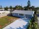 Updated home with well-maintained landscaping and a spacious driveway in a sunny neighborhood at 8 Palm Dr, Ormond Beach, FL 32176