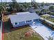 Charming home with new roof, freshly painted exterior, manicured landscaping, and inviting driveway at 8 Palm Dr, Ormond Beach, FL 32176
