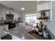 Updated kitchen with granite countertops, stainless steel appliances, and ample storage at 8 Palm Dr, Ormond Beach, FL 32176