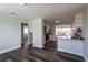 Modern kitchen with white cabinets, stainless steel appliances, and a granite countertop at 8 Palm Dr, Ormond Beach, FL 32176