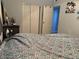 Well lit bedroom with tile floors and closet at 815 S Solandra Dr, Orlando, FL 32807