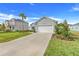 Lovely one-story home with a well-manicured lawn, an attached garage and a long drive at 9132 Sw 57Th Ter, Ocala, FL 34476