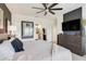 Stylishly designed main bedroom boasts a ceiling fan, and a contemporary aesthetic at 9132 Sw 57Th Ter, Ocala, FL 34476