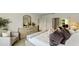 Elegant bedroom featuring stylish decor, soft lighting, and comfortable furnishings at 1015 Morfontaine St, Daytona Beach, FL 32124