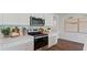 Bright kitchen featuring stainless steel appliances, white cabinetry and modern countertops at 1015 Morfontaine St, Daytona Beach, FL 32124