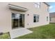 The home has a sliding glass door leading to the backyard, providing easy access to outdoor living at 1035 Morfontaine St, Daytona Beach, FL 32124