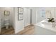 Well-lit bathroom showcases a sleek vanity, a modern shower, and tasteful decor for a spa-like experience at 1035 Morfontaine St, Daytona Beach, FL 32124