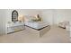 This bedroom boasts a plush carpet, stylish decor, and a calming neutral palette for relaxation at 1035 Morfontaine St, Daytona Beach, FL 32124