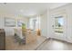 Bright dining room with modern furnishings and a view of the lake at 1035 Morfontaine St, Daytona Beach, FL 32124