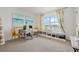 Bright home office featuring a built-in window seat and modern furnishings, perfect for productivity and comfort at 1035 Morfontaine St, Daytona Beach, FL 32124