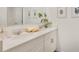 Modern bathroom with dual sinks, white cabinetry, quartz countertop, and chrome fixtures at 1039 Morfontaine St, Daytona Beach, FL 32124