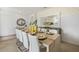 Well-appointed dining room with a large rustic table, seating for six, and decorative accents at 1039 Morfontaine St, Daytona Beach, FL 32124