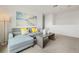 Modern living room featuring a gray sectional sofa, white decor, and lots of natural light at 1039 Morfontaine St, Daytona Beach, FL 32124