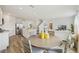 Open-concept living space with a dining area, kitchen with island, and Gathering room at 1039 Morfontaine St, Daytona Beach, FL 32124
