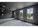 This spacious bonus room offers plush carpeting, recessed lighting and a view of the neighborhood at 10849 Emerald Chase Dr, Orlando, FL 32836