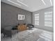 Stylish home office with modern decor, natural light, and comfortable seating at 10849 Emerald Chase Dr, Orlando, FL 32836