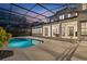 Backyard pool with screened enclosure offering privacy and an elegant outdoor living space at 10849 Emerald Chase Dr, Orlando, FL 32836