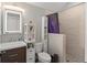 Bathroom featuring a vanity with sink, walk-in shower with tile surround, updated fixtures and an abundance of storage at 1103 Lindley Cove Cir, Deland, FL 32724