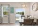 Charming dining area with views of the lake, perfect for enjoying meals with Gathering and friends at 1103 Lindley Cove Cir, Deland, FL 32724