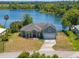 Charming single-Gathering home featuring an attached two-car garage and a beautiful lake view at 1103 Lindley Cove Cir, Deland, FL 32724