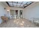 Enclosed patio with tiled flooring and an outdoor ceiling at 1136 Lakewood Park Dr, Daytona Beach, FL 32117
