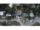 Aerial view of property lines with house, driveway, and solar panels on roof at 1313 Pine Ridge Dr, Daytona Beach, FL 32117