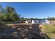 Large backyard features a spacious lawn and privacy fence at 1313 Pine Ridge Dr, Daytona Beach, FL 32117