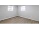 Bright bedroom features new floors and fresh paint, offering a blank canvas for personalization at 1313 Pine Ridge Dr, Daytona Beach, FL 32117