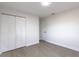 Clean bedroom with new floors, spacious closets, and fresh paint; move-in ready at 1313 Pine Ridge Dr, Daytona Beach, FL 32117