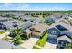 Aerial view of a residential neighborhood with single-Gathering homes, well-maintained lawns, and tree-lined streets at 15186 Book Club Rd, Winter Garden, FL 34787