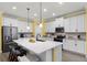 Bright kitchen features a large island, stainless steel appliances, and plenty of cabinet space at 15186 Book Club Rd, Winter Garden, FL 34787