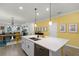 Stylish kitchen featuring a spacious island, sleek countertops, and an open layout at 15186 Book Club Rd, Winter Garden, FL 34787