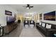 Spacious living room with tile floors, stylish furnishings, and an open layout at 15186 Book Club Rd, Winter Garden, FL 34787