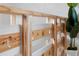 Close-up of a wooden bed frame showcasing natural wood grain and design details at 1521 E Harwood St, Orlando, FL 32803
