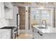 Kitchen with modern cabinets and stainless steel appliances at 1521 E Harwood St, Orlando, FL 32803