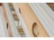 Close-up of natural wood stair railing showing the unique design with exposed wooden pegs at 1521 E Harwood St, Orlando, FL 32803