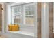 Close up of window seat with custom window shutters and throw pillows at 1521 E Harwood St, Orlando, FL 32803