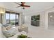Inviting living area with a balcony overlooking the water, perfect for relaxing and enjoying the scenery at 16300 County Road 455 # 204, Montverde, FL 34756