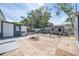 Large backyard featuring an outdoor storage area and a fire pit at 194 Larkspur Ct, Kissimmee, FL 34743
