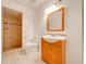 Bathroom features a modern vanity and a walk-in tiled shower at 194 Larkspur Ct, Kissimmee, FL 34743